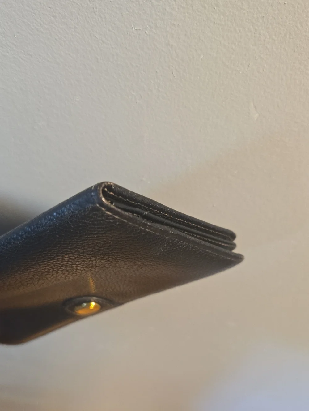Dunhill Black Pebble Leather Continental Wallet with Gold Accent